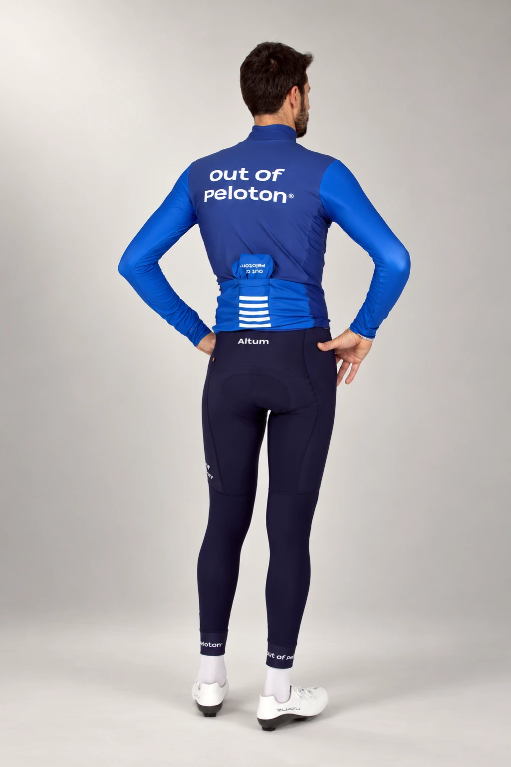 Full winter look from behind, studio — blue Thermal Jersey and navy Altum Thermal Tights